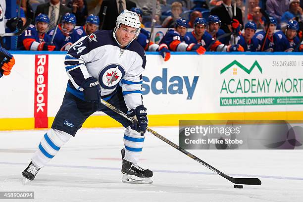 Grant Clitsome of the Winnipeg Jets skates against the New York Islanders at Nassau Veterans Memorial Coliseum on October 28, 2014 in Uniondale, New...