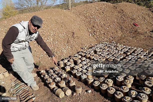 Iraqi mine-hunter shows removed land mines laid by Ba'ath Party on the mountainous terrain of Penjwin district near Iraqi-Iranian border crossing in...