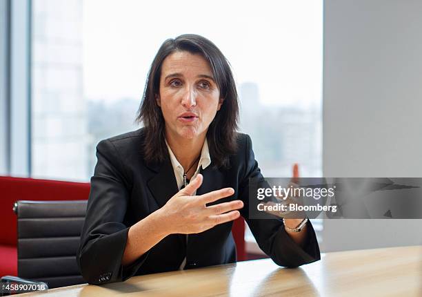 Maelys Castella, chief financial officer of Akzo Nobel NV, gestures as she speaks during an interview at the company's headquarters in Amsterdam,...