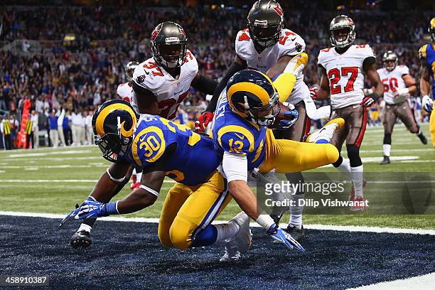 Stedman Bailey of the St. Louis Rams scores a touchdown against the Tampa Bay Buccaneers at the Edward Jones Dome on December 22, 2013 in St. Louis,...