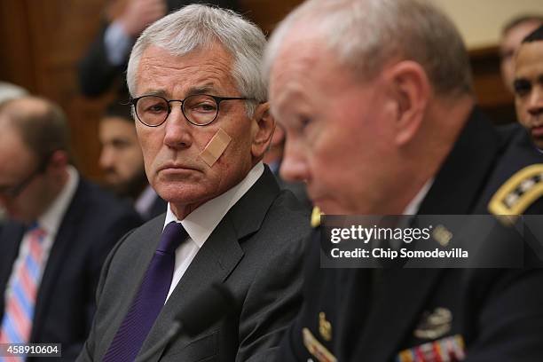 Defense Secretary Chuck Hagel and Chairman of the Joint Chiefs of Staff Gen. Martin Dempsey testify before the House Armed Services Committee about...