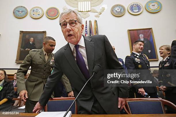 Defense Secretary Chuck Hagel prepares to testify before the House Armed Services Committee about the ongoing fight against the group calling itself...