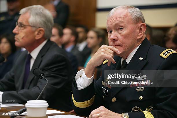 Chairman of the Joint Chiefs of Staff Gen. Martin Dempsey and Defense Secretary Chuck Hagel testify before the House Armed Services Committee about...