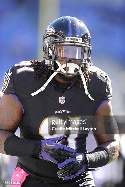 Courtney Upshaw of the Baltimore Ravens looks on before a NFL football game against the Atlanta Falcons at M&T Bank Stadium on October 19, 2014 in...