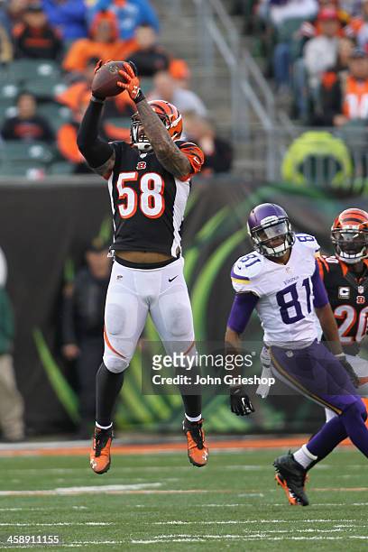Rey Maualuga of the Cincinnati Bengals intercepts a pass intended for Jerome Simpson of the Minnesota Vikings during their game at Paul Brown Stadium...