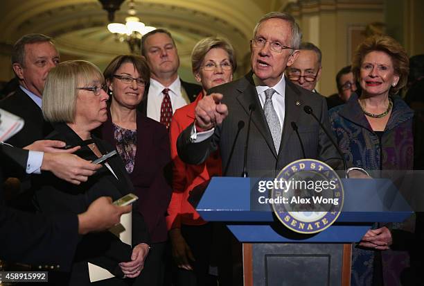 Senate Majority Leader Sen. Harry Reid speaks to members of the media as Senate Majority Whip Sen. Richard Durbin , Sen. Patty Murray , Sen. Amy...