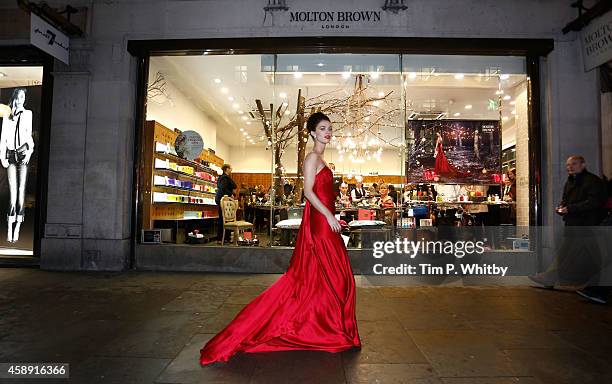 Model who stars in the Molten Brown Christmas campaign helps to re-create 'The Molton Brown Splendid Christmas' Party' at the flagship store on...