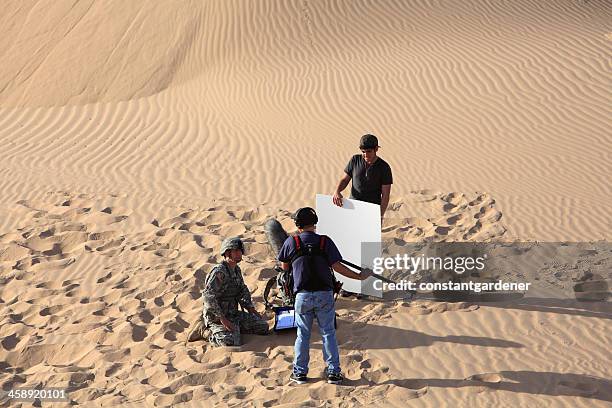 filming in the imperial sand dunes - reflector stock pictures, royalty-free photos & images