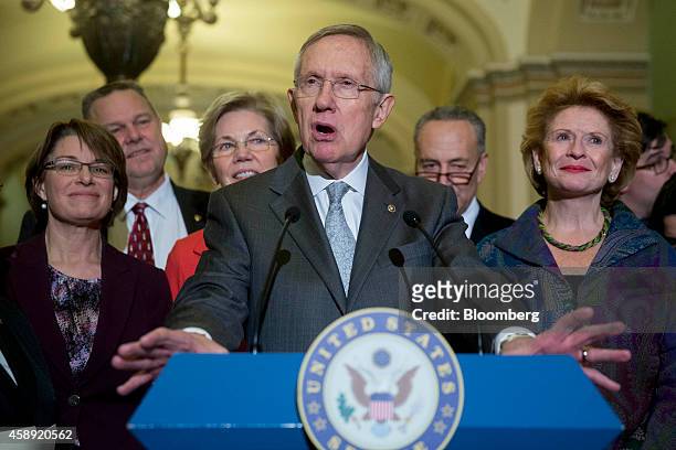 Senate Majority Leader Harry Reid, a Democrat from Nevada, speaks during a news conference with fellow Senate Democrats, from left, Senator Amy...