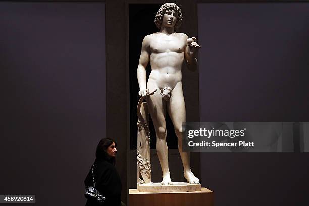 The marble statue named Adam, created in the 1490s by Italian Renaissance artist Tullio Lombardo, stands on display at the Metropolitan Museum of Art...