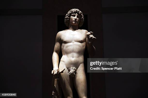 The marble statue named Adam, created in the 1490s by Italian Renaissance artist Tullio Lombardo, stands on display at the Metropolitan Museum of Art...