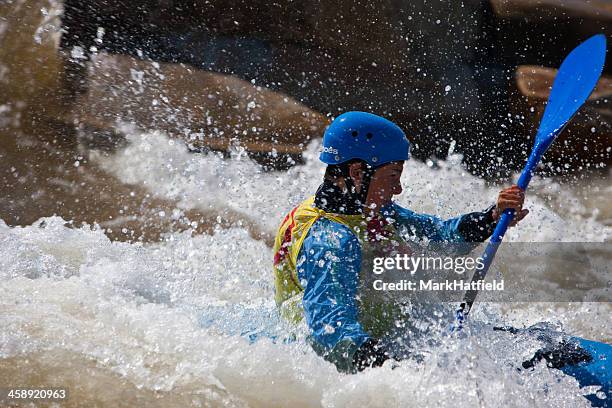 kayaker splashes through a wave and spray - charlotte north carolina with people stock pictures, royalty-free photos & images