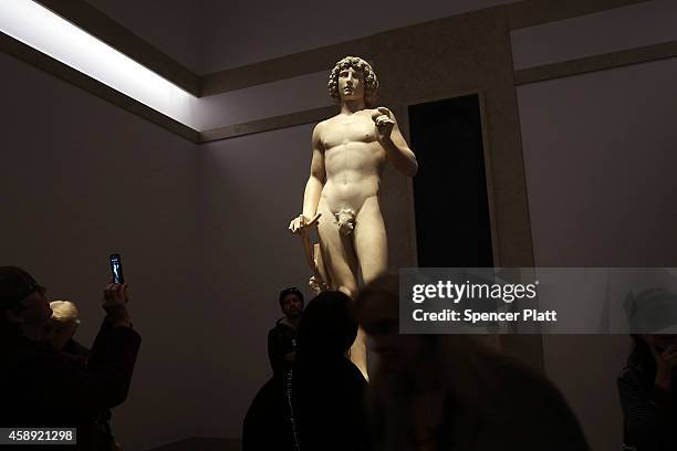 The marble statue named Adam, created in the 1490s by Italian Renaissance artist Tullio Lombardo, stands on display at the Metropolitan Museum of Art...