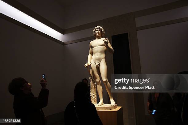 The marble statue named Adam, created in the 1490s by Italian Renaissance artist Tullio Lombardo, stands on display at the Metropolitan Museum of Art...