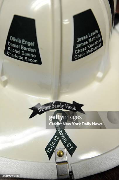 Sandy Hook Memorial Helmet with all the victims names Donated to Sandy Hood Firehouse from Washington, CT after the Sandy Hook Elementary School...