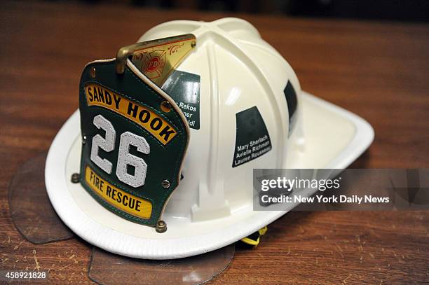 Sandy Hook Memorial Helmet with all the victims names Donated to Sandy Hood Firehouse from Washington, CT after the Sandy Hook Elementary School...