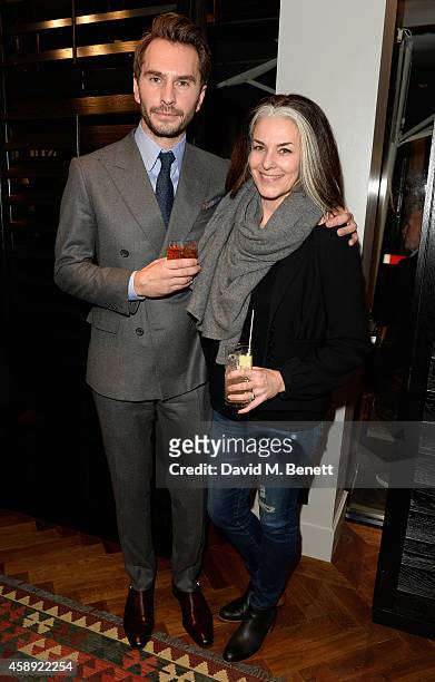 Luke Sweeney and Catherine Hayward attend the opening of the new Thom Sweeney RTW & MTM Store on November 13, 2014 in London, England.
