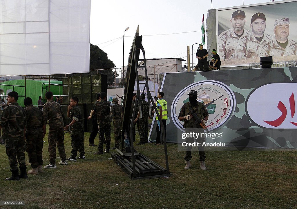 Izz ad-Din al-Qassam Brigades attend an event in Rafah