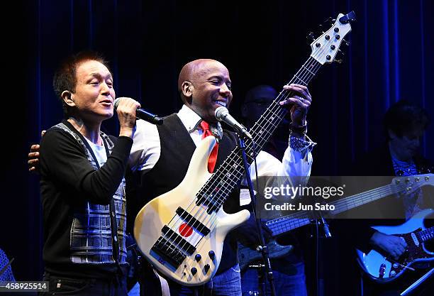 Singer/ songwriter Kazumasa Oda and Daft Punk bass player Nathan East perform on stage during Nathan East Solo Debut Concert at Billboard Live on...