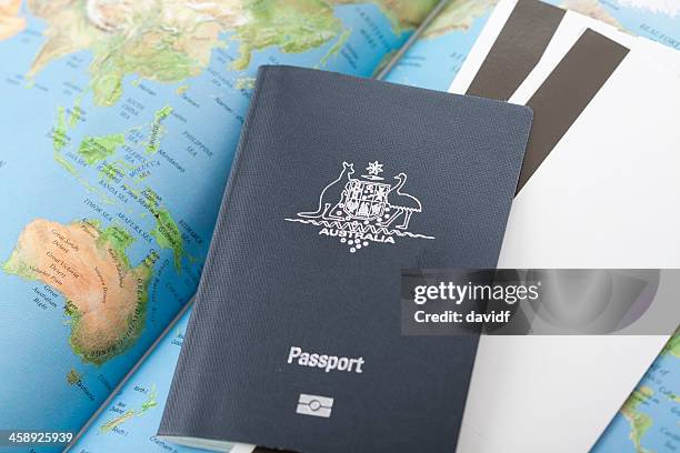 australian passport with map of the world and boarding passes - australian passport bildbanksfoton och bilder