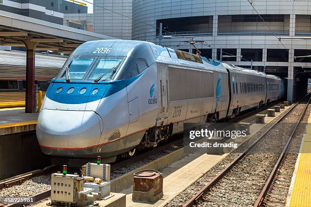 amtrak acela express train at boston's south station - amtrak stock pictures, royalty-free photos & images