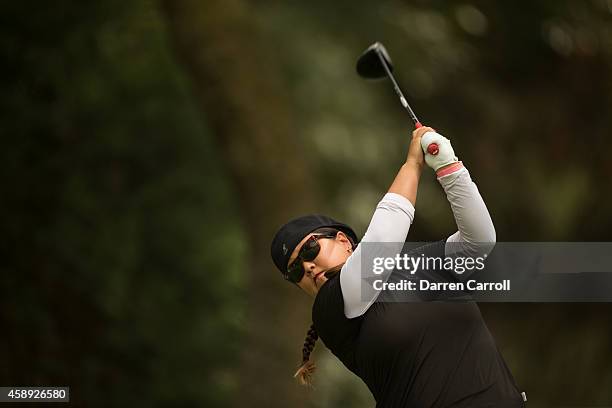 Christina Kim of the United States plays a tee shot at the seventh hole during the first round of the 2014 Lorena Ochoa Invitational presented by...