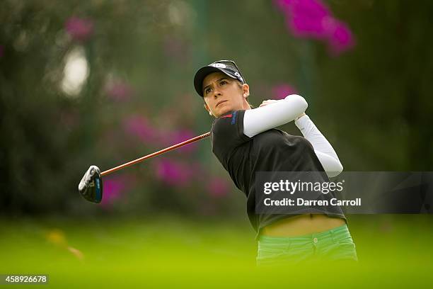 Azahara Munoz of Spain plays a tee shot at the sixth hole during the first round of the 2014 Lorena Ochoa Invitational presented by Banamex at Club...