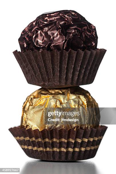 ferrero rocher stacked chocolates - ferrero rocher chocolate stock pictures, royalty-free photos & images