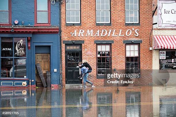 navigating hurricane sandy’s flood waters in annapolis, maryland - annapolis stock pictures, royalty-free photos & images