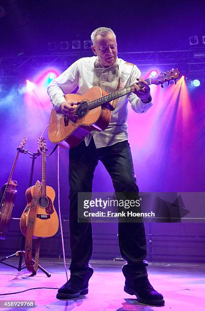 Australian guitarist and singer Tommy Emmanuel performs live during a concert at the Huxleys on November 13, 2014 in Berlin, Germany.