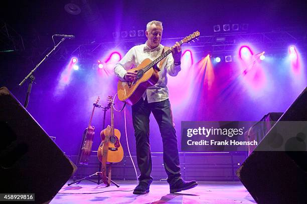 Australian guitarist and singer Tommy Emmanuel performs live during a concert at the Huxleys on November 13, 2014 in Berlin, Germany.