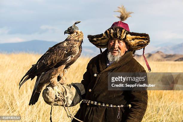 mongolian eagle hunter - kazakhstan steppe stock pictures, royalty-free photos & images