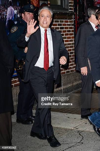 Television personality Jon Stewart leaves the "Late Show With David Letterman" taping at the Ed Sullivan Theater on November 13, 2014 in New York...
