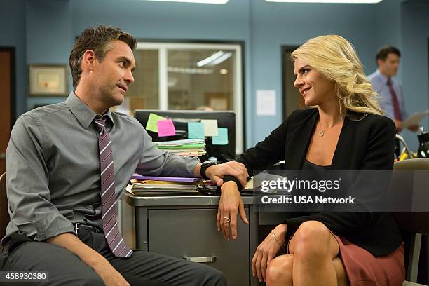 Shark, Actually" Episode 105 -- Pictured: Jay Harrington as Phil, Eliza Coupe as Nina --