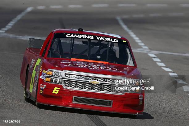 Norm Benning, driver of the Tom Corbett for PA Governor Chevrolet, during practice for the NASCAR Camping World Truck Series WinStar World Casino &...