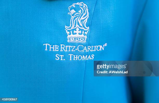 ritz - carlton st thomas logo on  bell hop's uniform - embroidery stock pictures, royalty-free photos & images