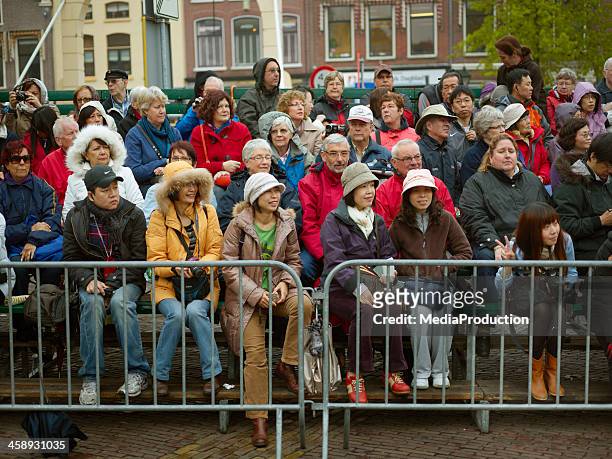 spectators at dutch cheese market show - cheese production in netherlands stock pictures, royalty-free photos & images