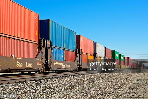 railroad train freight container carriers, palm springs, california - rail freight stock pictures, royalty-free photos & images