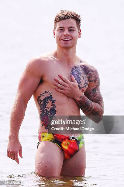 Jamie Elliott participates in a recovery session after the finish of the triathlon during a Collingwood Magpies AFL Fitness Camp on November 14, 2014...