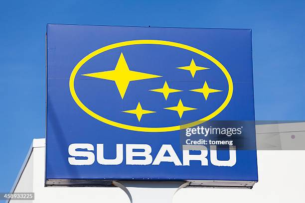 subaru sign above dealership - subaru stock pictures, royalty-free photos & images