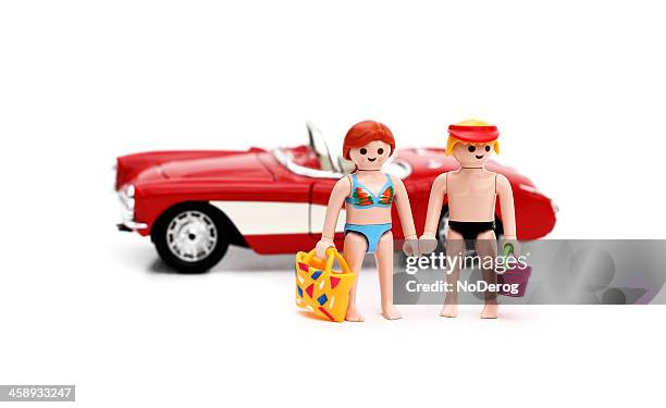 playmobil figurines at the beach - playmobil stock pictures, royalty-free photos & images