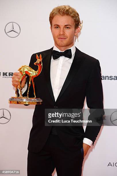 Nico Rosberg poses with his award during Kryolan at the Bambi Awards 2014 on November 13, 2014 in Berlin, Germany.