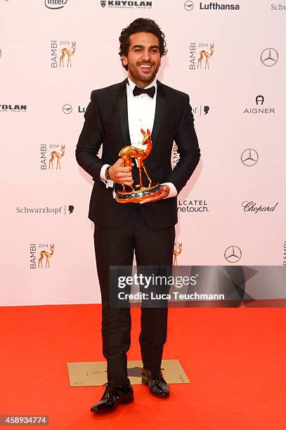 Elyas M'Barek poses with his award during Kryolan at the Bambi Awards 2014 on November 13, 2014 in Berlin, Germany.