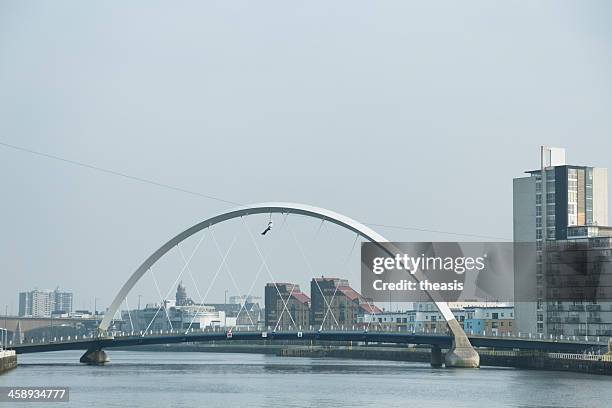 fundraiser on a zipline by the finnieston bridge - steel cable stock pictures, royalty-free photos & images