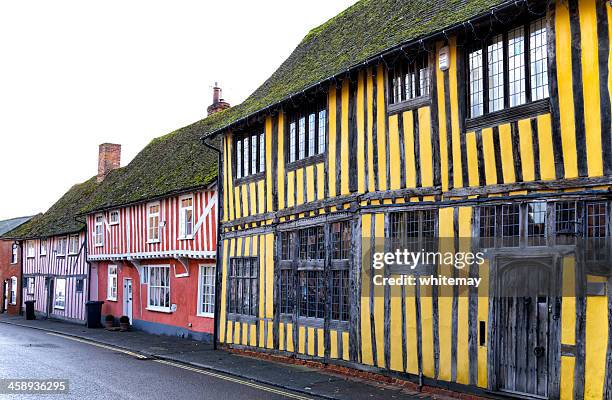 colourful old houses in lavenham - tudor style stock pictures, royalty-free photos & images