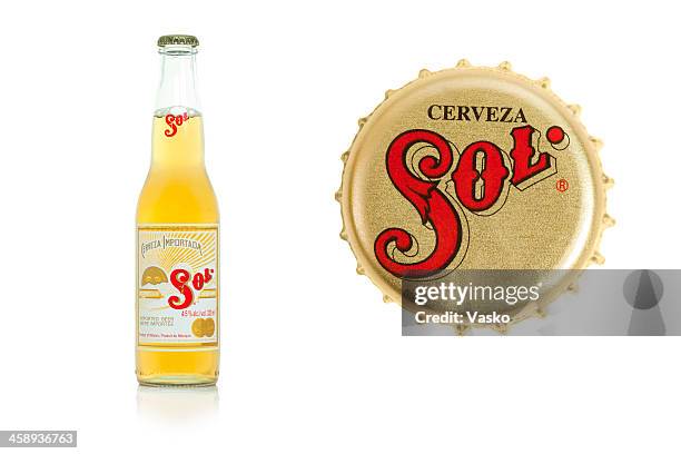 sol beer & bottle cap - lager stock pictures, royalty-free photos & images