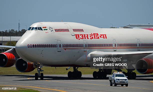 Plane carrying Indian Prime Minister Narendra Modi arrives at Brisbane Airport to attend the G20 Leader's Summit on November 14, 2014. The G20...