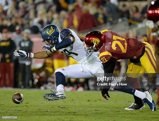 Stephen Anderson of the California Golden Bears drops a pass in front of Su'a Cravens of the USC Trojans at Los Angeles Memorial Coliseum on November...
