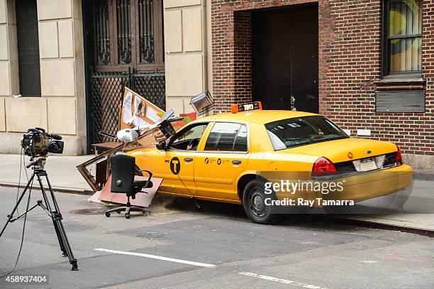 Taxi destroys an office desk during a segment at the "Late Show With David Letterman" taping at the Ed Sullivan Theater on November 13, 2014 in New...