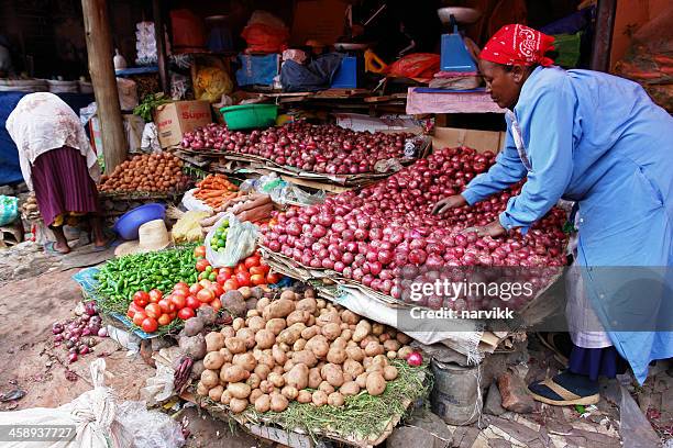 african woman selling vegetables on the local market - addis ababa market stock pictures, royalty-free photos & images